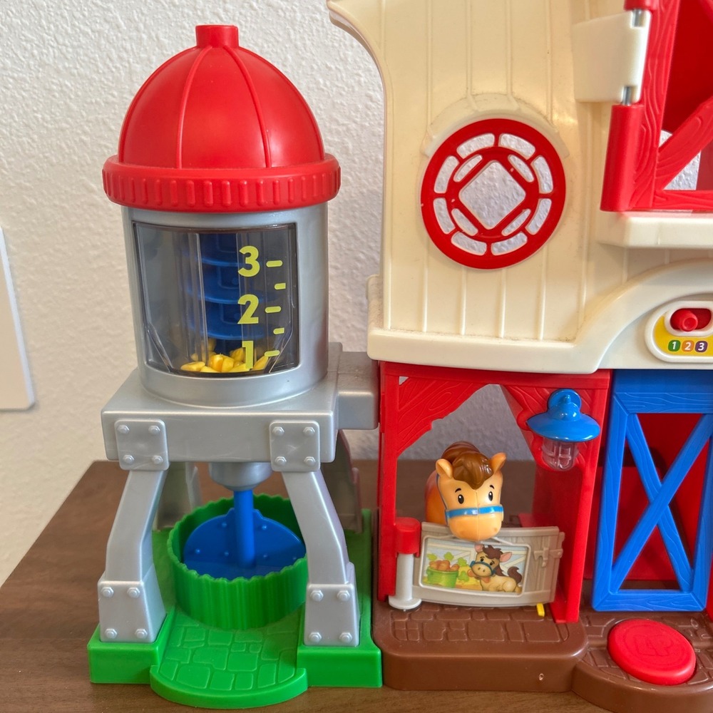 Fisher-Price Little People Caring for Animals Farm Playset with 4 Figures - Picture 3 of 10